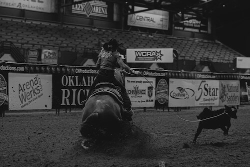 Josie Conner roping a calf at a rodeo