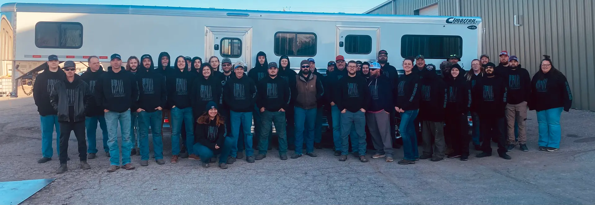 A crowd of people who work at Cimarron